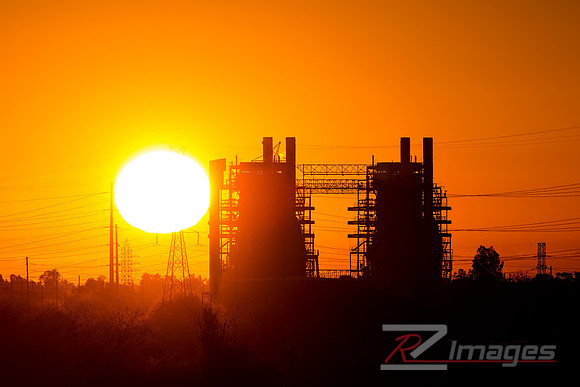 Electric Power plant at sunset.