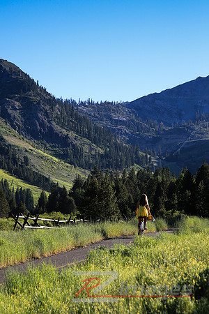 Girl on a bike in Squaw Valley CA.