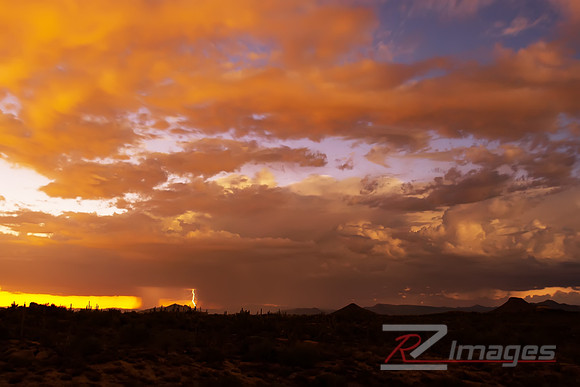 Thunderstorm in desert sky with threatening clouds.