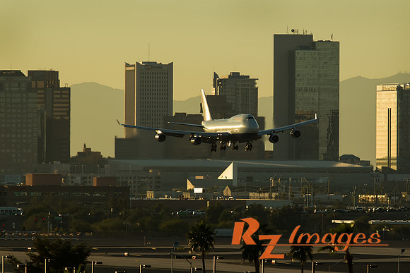 747 descending into Sky Harbor Airport at Sunset.